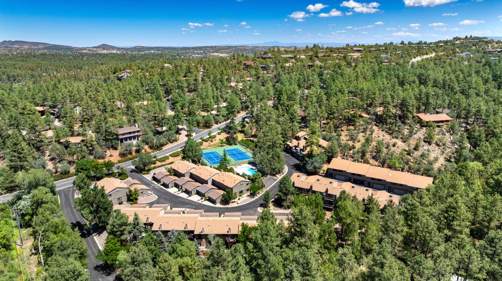 Aerial view of Haisley Homestead townhomes, pool and tennis courts in the pines, Prescott AZ