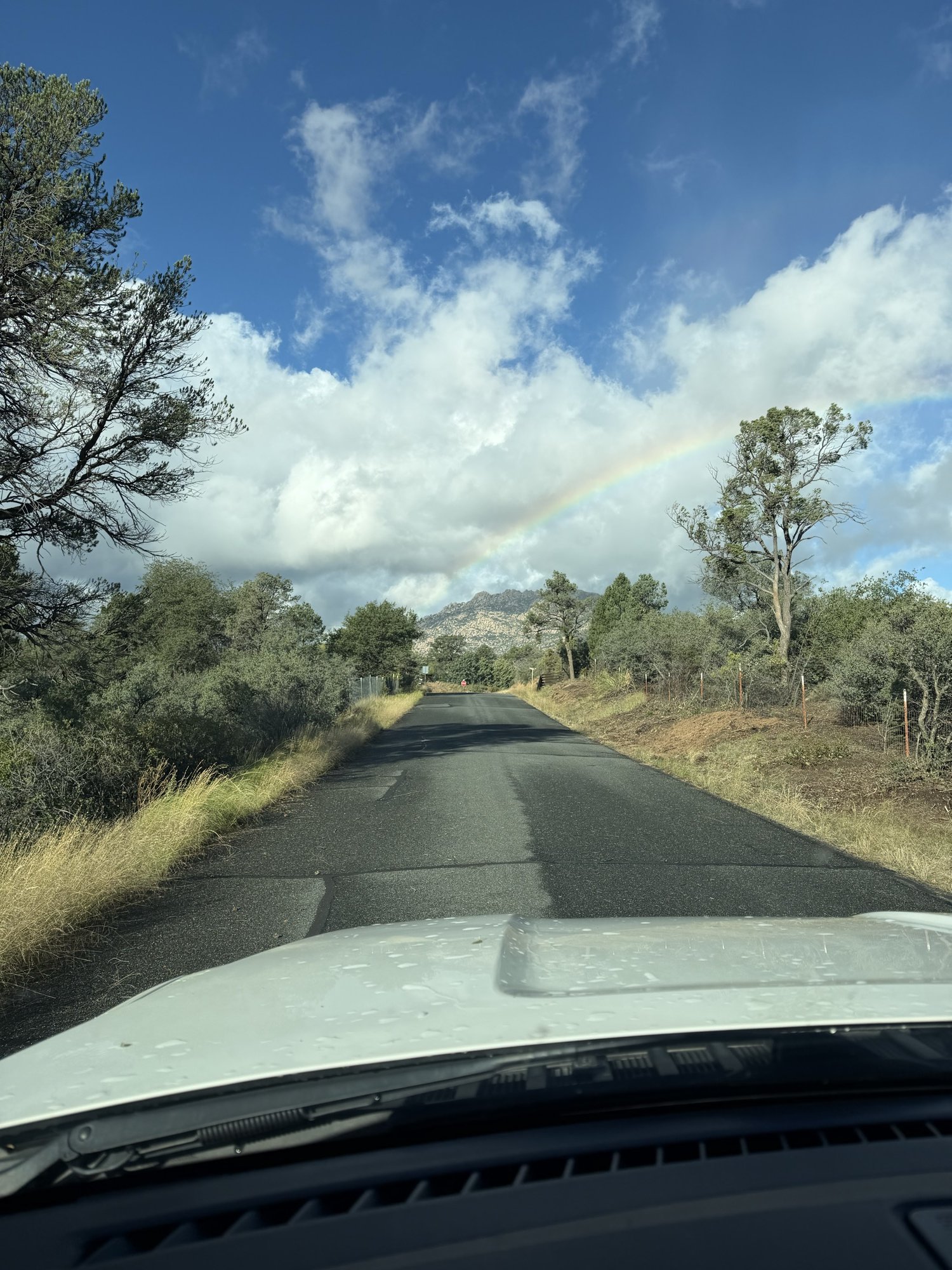 A rainbow over Granite Mountain on a country road in Williamson Valley, Prescott AZ