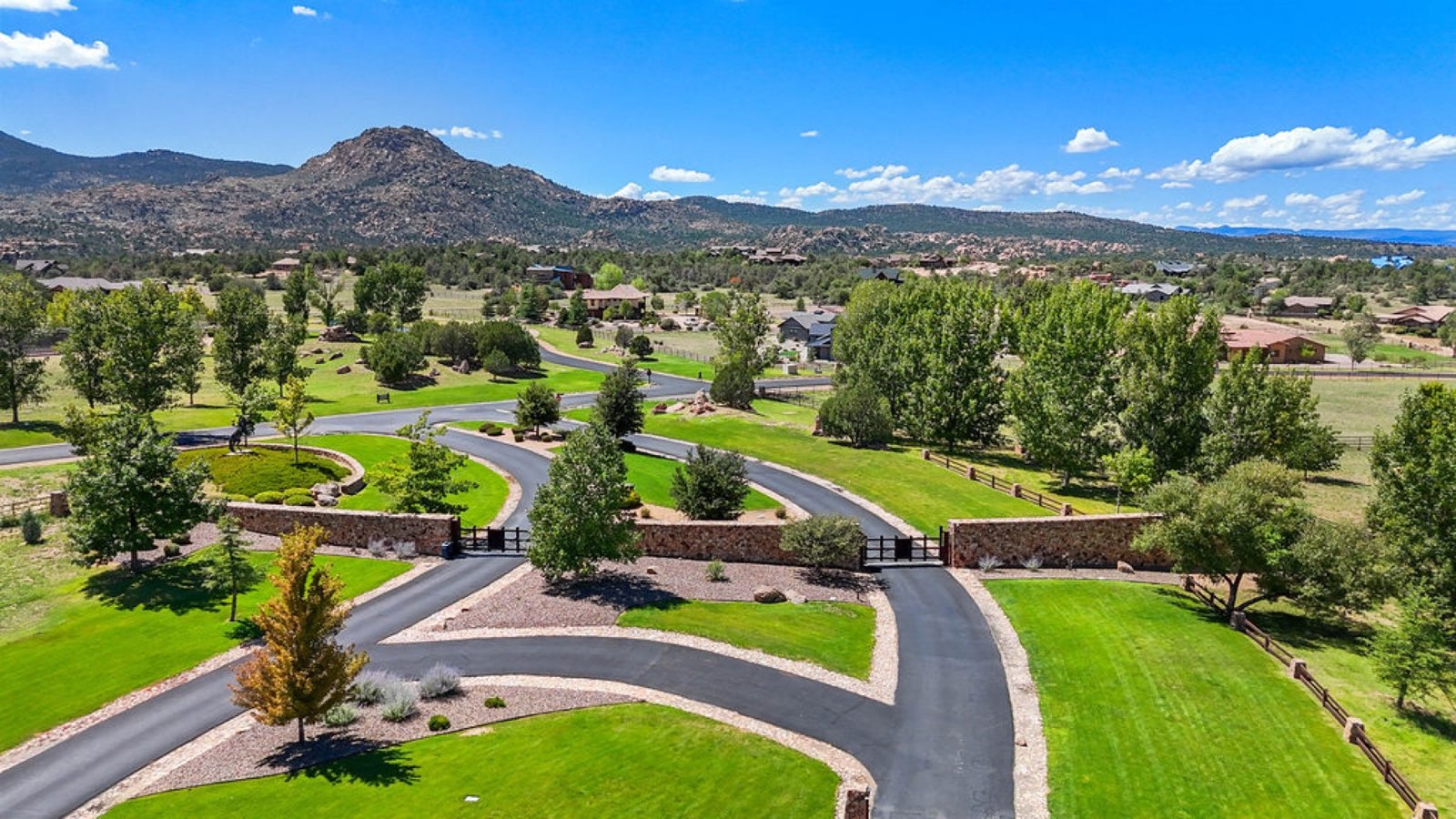 Aerial view of the American Ranch gated entrance below Granite Mountain, Prescott AZ